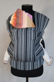 Reversible Karaush ergo baby carrier made of sling fabric of different colors and types of weaving 