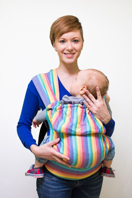 The reversible baby carrier is used just as any other baby carrier, however, changing the front may be challenging.