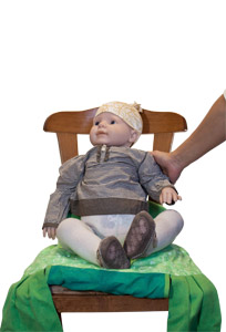 Put the baby on chair ATTENTION! Use the carrier for a traveling chair for those babies who are able to sit upright
